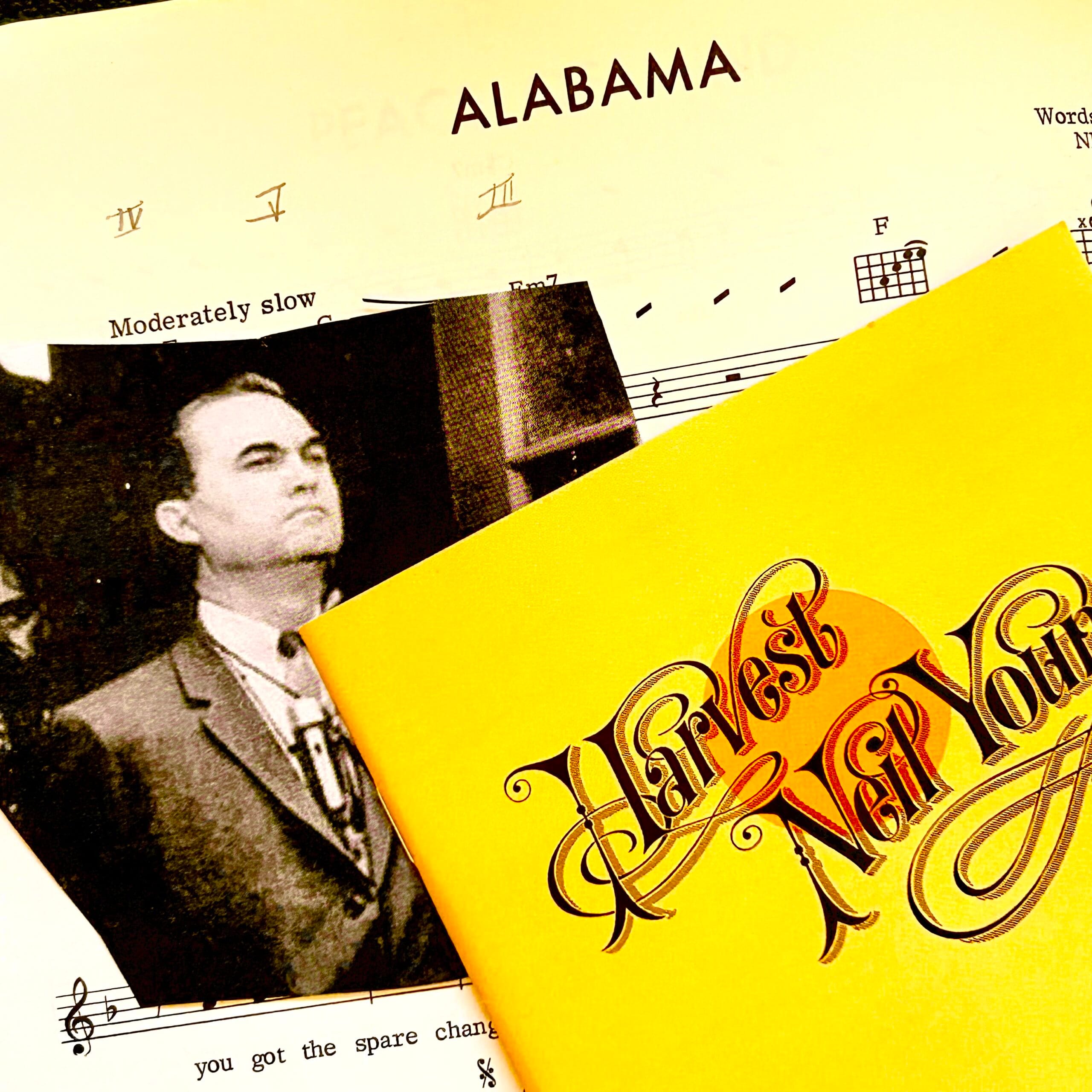 collage image of Gov. George Wallace enforcing segregation, cover art from Neil Young's "Harvest" album, and sheet music for Young's song "Alabama."